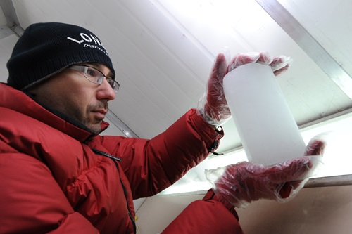 Dr Mauro Rubino holds a Greenland ice core