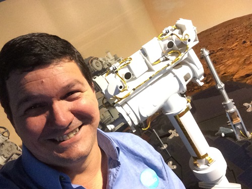 Me and my Rover. Paulo de Souza with a model of the Mars Rover, Opportunity.