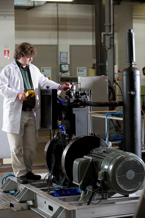 A researcher tests the Direct Injection Carbon Engine