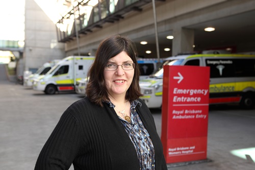 Dr Sarah Dods stands outside an Emergency department in a major hospital