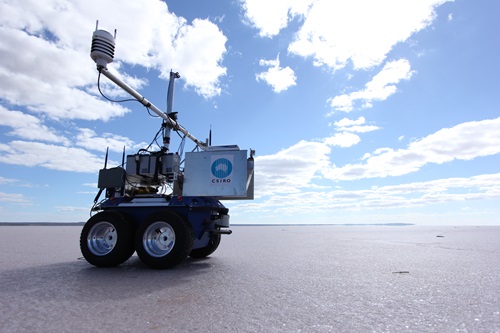 A prototype autonomous vehicle on a salt flat.