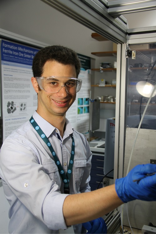 Mark Styles alongside specialist X-ray analysis equipment.