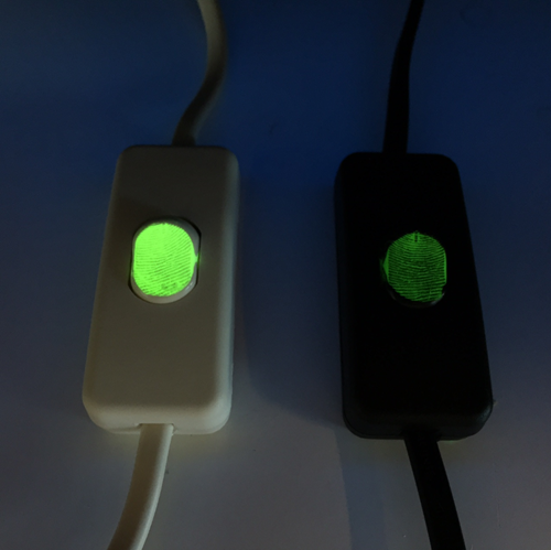 Glowing fingerprints on light switches.