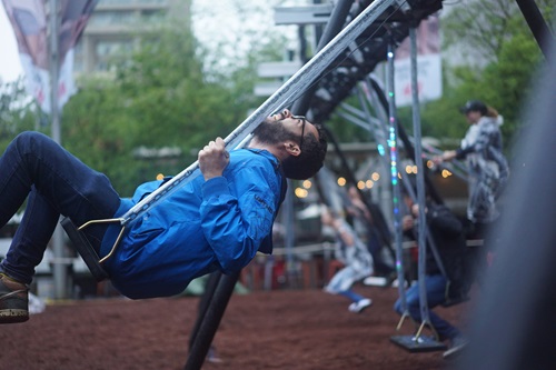 Man on Infinity swing.