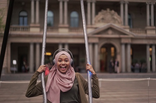 Woman on Infinity swing.