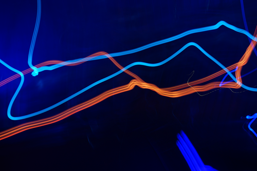 Blue and orange streaks of light. 
