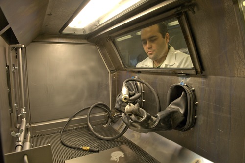 Man working with equipment in Lab 22.