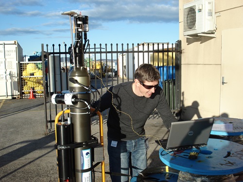 Nick Hardman-Mountford checking a BioArgo’s satellite communication link via a laptop.