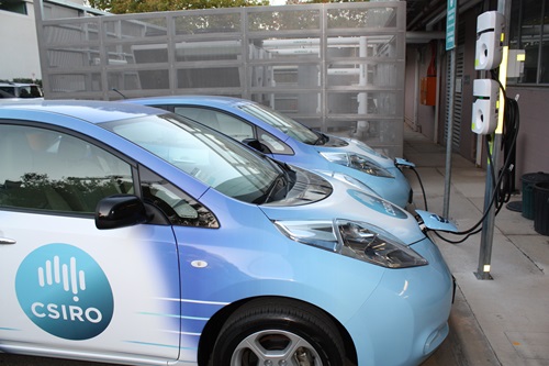 Electric cars in charging bay