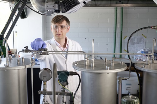 A scientist working on FloWorks equipment. 