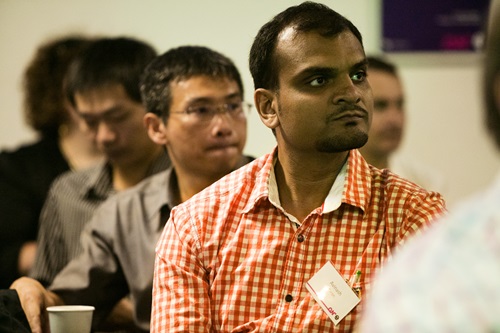 People listening to a presentation.