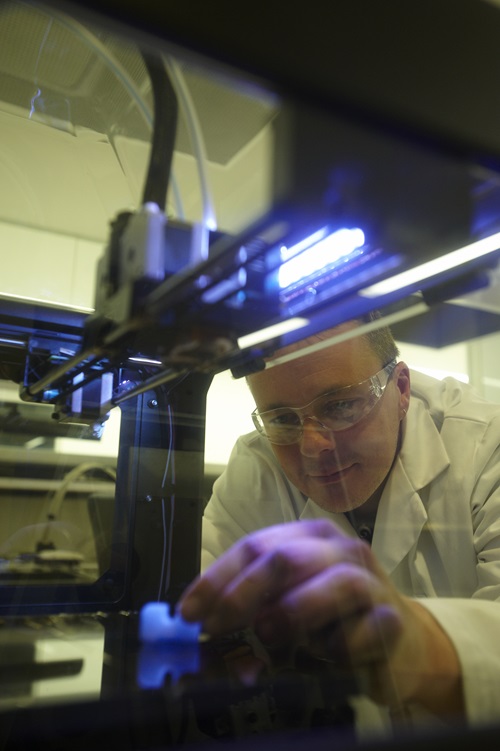 Mr David Fox using the 3D Printer creating components for Instrumentation.