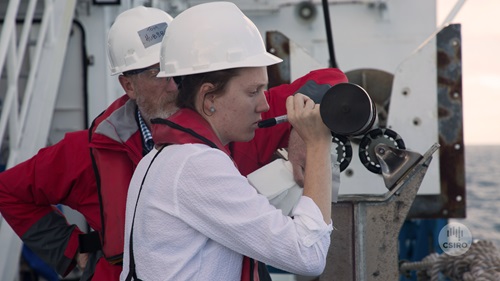 Scientist working with student on the Marine National Facility RV Investigator.