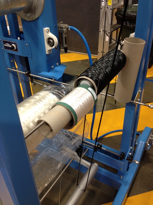Close up view of part of the machinery rollers used to manufacture carbon fibre.