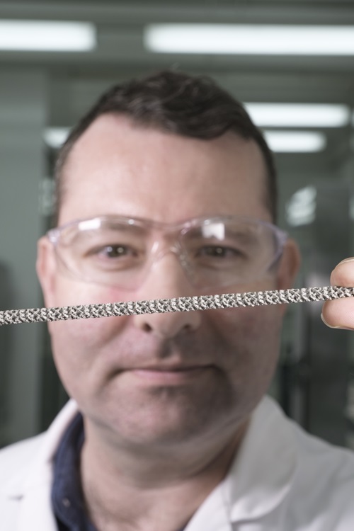 Dr James Gardiner inspects a Catalytic Static Mixer