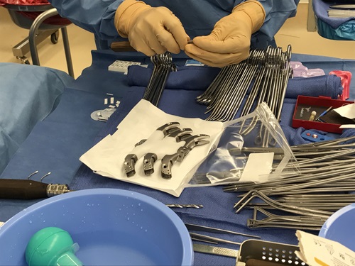 3D printed sternum and rib cage transplant on a medical table