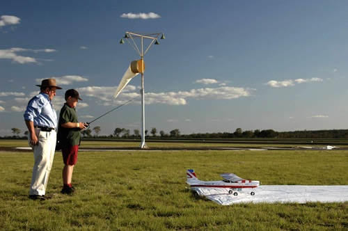 A teacher from South Burnett Catholic College oversees the launch of their team's UAV for the high school category of the 2007 UAV Outback Rescue Challenge.