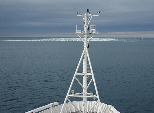 Investigator approaching ice edge during cold water trials in 2015.