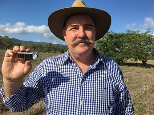David Smith holding up a Ceres Tag.