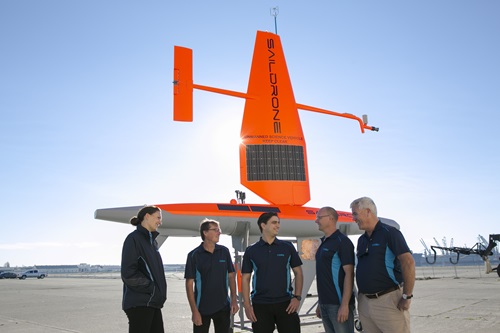 Research team with a Saildrone.