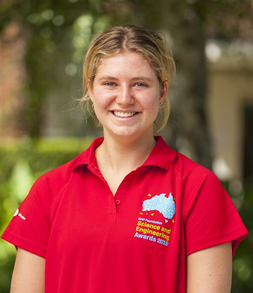 Lucy Lake wearing a red BHP Foundation Science and Engineering Awards 2019 shirt.
