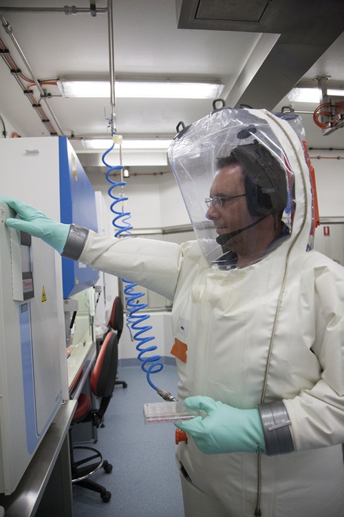 CSIRO scientists perform biosecurity tests at the Australian Animal Health Laboratory