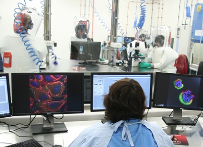 Scientists in protective suits