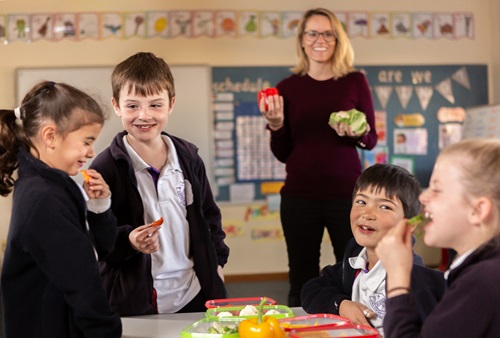 Children eat vegetables