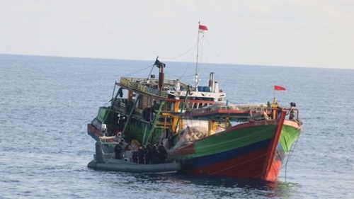 Fishing vessel on the ocean. 