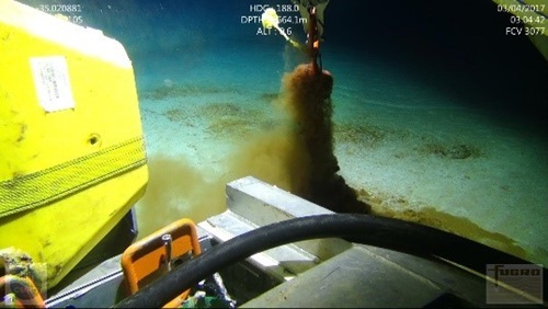 Machine collecting soil samples from the sea floor. 