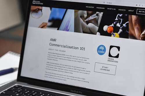 A laptop showing the introduction to the AMR Commercialisation 101 course. 