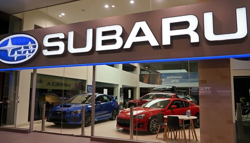 Materials used to make cars in Japan that are exported and sold in Australia go into Australia’s material footprint. Pictured Subaru automobile dealership on Forbes Street, Sydney. By Catrin Haze/Shutterstock