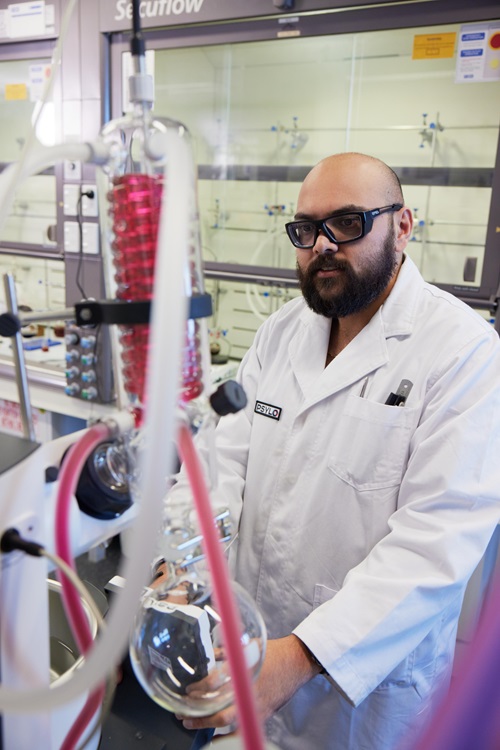 Researcher at Psylo with equipment