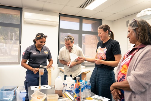 Living STEM program lead, Dave Broun, Murujuga Aboriginal Corporation Ranger Sarah, with teachers Bec and Irene at the first Living STEM workshop with hands on science activities.