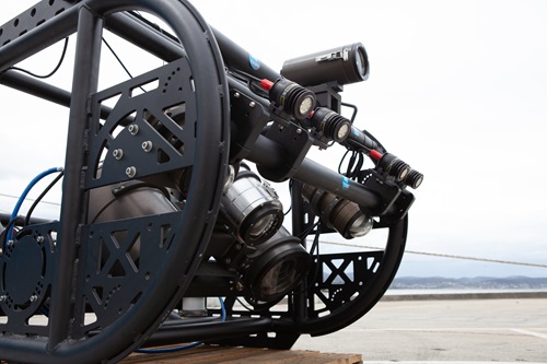 A piece of scientific equipment with cameras on it.