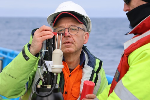 Voyage co-chief scientist Benoit Legresy preparing the EM-APEX float for deployment.
