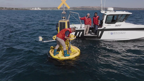 SARDI research team replace one of the water sensors on the AquaWatch buoy in the Spencer Gulf.