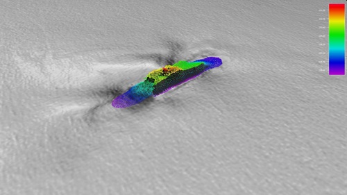 A map showing a colourful wreck on the seafloor shown in grey.
