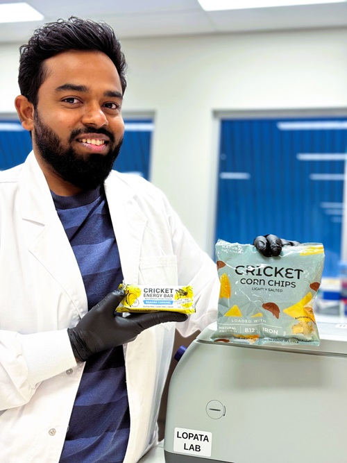  James Cook University researcher Dr Shay Karnaneedi with examples of insect - based food.
