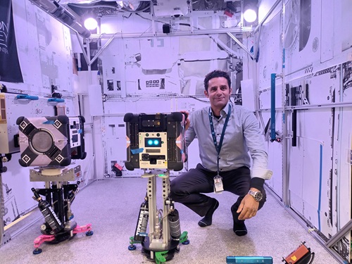 CSIRO Project Lead Dr Marc Elmouttie with the multi-resolution scanning payload, housed within an Astrobee robot. 