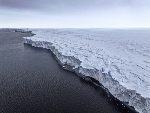 Drone image of the edge of the Denman glacier and the ocean.