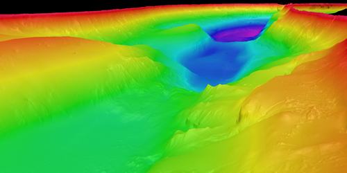 An image of a lake shown in bright colours that represent different water depths.
