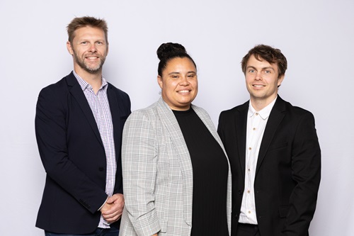 Team corporate headshot, one female and two men in corporate clothes.