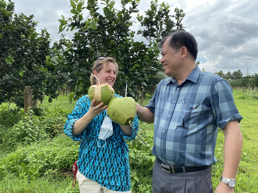 Two people share a coconut toast