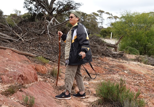 Person walking in an ochre pit