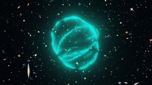 Glowing green circles are in the centre of the image, surrounded by galaxies.