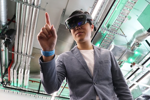 Scientist wearing augmented reality glasses.