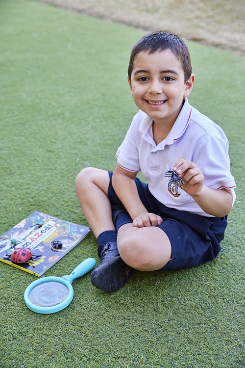 Raphael Da Rosa, Year 1 student at Cannon Hill Anglican College is fascinated with spiders wasps featured in AmAZed!