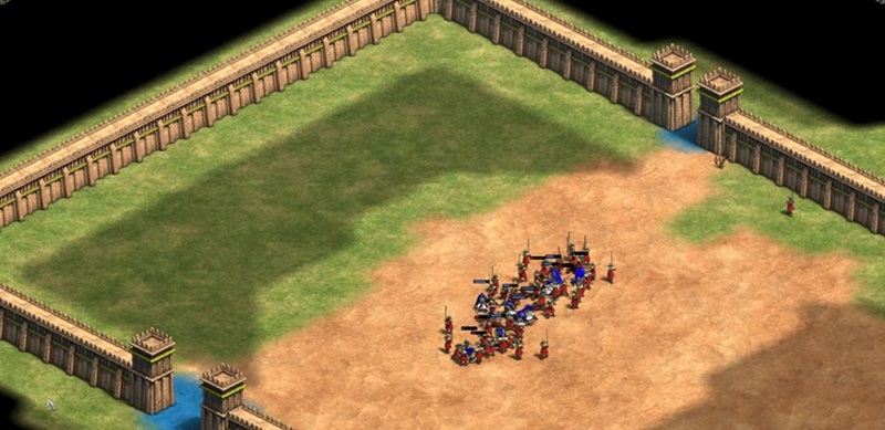 A small army of Teutonic Knights (blue) are surrounded and overwhelmed by 60 Two-Handed Swordsmen in a simple battlefield in the strategy game, Age of Empires II.