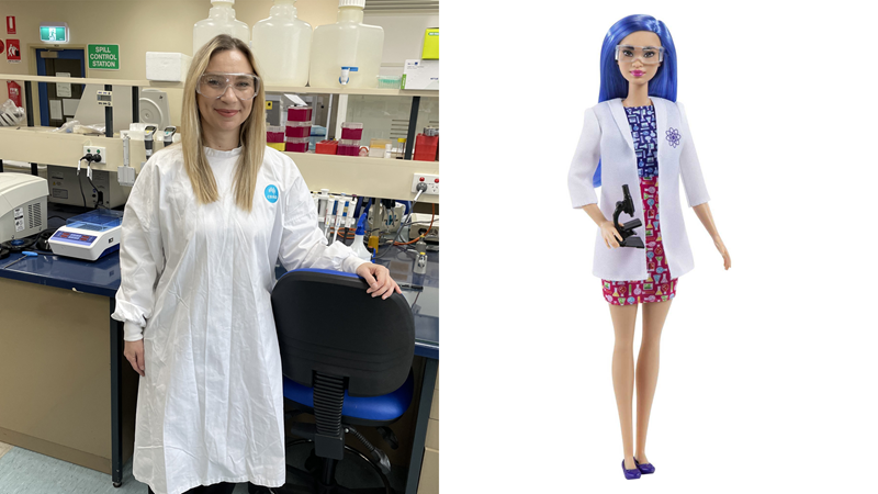 Photo of a woman (Dr Rozita Spirovska Vaskoska) smiling in a lab wearing a CSIRO lab coat, next to the Scientist Barbie